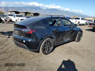 2022 Tesla Model Y Long Range z VIN 7SAYGDEE2NF391349, wystawiony jako Copart lot #85351924 z przebiegiem 5 670 mil mil oraz Szkoda całkowita • Salvage title. Historia ofert i sprzedaży dostępna na DreamBid. Obrazek 3.