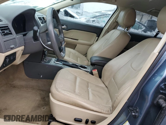 2012 Ford Fusion SEL z VIN 3FAHP0JA7CR300456, wystawiony jako Copart lot #44750125 z przebiegiem 144 788 mil mil oraz Szkoda całkowita • Salvage title. Historia ofert i sprzedaży dostępna na DreamBid. Obrazek 7.