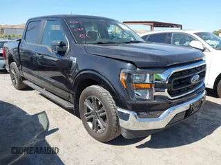 2023 Ford F-150 XL with VIN 1FTEW1C80PKD24124, listed as a IAAI auction lot 42356966 with 52,104 mi miles and . Bid and sale history available at DreamBid. Image 1.