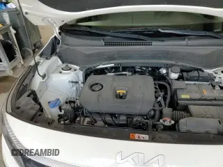 2023 Kia Seltos LX z VIN KNDEPCAA1P7411158, wystawiony jako Copart lot #71606795 z przebiegiem 25 512 mil mil oraz Szkoda całkowita • Salvage title. Historia ofert i sprzedaży dostępna na DreamBid. Obrazek 14.
