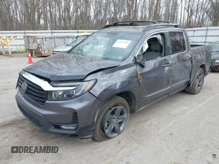2023 Honda Ridgeline RTL z VIN 5FPYK3F58PB014460, wystawiony jako IAAI lot #41875307 z przebiegiem 77 565 mil mil oraz . Historia ofert i sprzedaży dostępna na DreamBid. Obrazek 2.