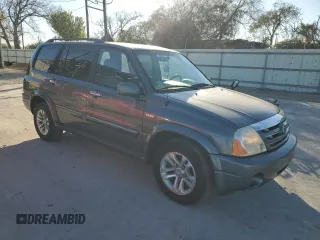 2005 Suzuki XL7 LX z VIN JS3TY92V554107839, wystawiony jako Copart lot #88328455 z przebiegiem 122 912 mil mil oraz Szkoda całkowita • Salvage title. Historia ofert i sprzedaży dostępna na DreamBid. Obrazek 4.