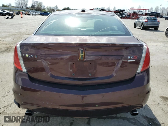2012 Lincoln MKS EcoBoost with VIN 1LNHL9FT0CG800031, listed as a Copart auction lot 50520885 with 101,080 mi miles and Salvage title. Bid and sale history available at DreamBid. Image 6.