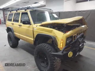 2001 Jeep Cherokee Sport z VIN 1J4FF48S41L580319, wystawiony jako IAAI lot #42064564 z przebiegiem 257 534 mil mil oraz . Historia ofert i sprzedaży dostępna na DreamBid. Obrazek 1.