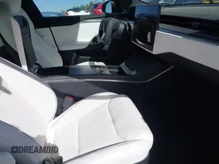 2022 Tesla Model S Plaid with VIN 5YJSA1E62NF460634, listed as a IAAI auction lot 41372644 with 16,050 mi miles and . Bid and sale history available at DreamBid. Image 5.