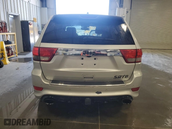 2012 Jeep Grand Cherokee SRT8 with VIN 1C4RJFDJ2CC105829, listed as a Copart auction lot 51840385 with 142,146 mi miles and Clean Title. Bid and sale history available at carsss.com. Image 6.