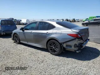 2025 Toyota Camry LE with VIN 4T1DAACK2SU517728, listed as a Copart auction lot 52567455 with 28,385 mi miles and Salvage Title. Bid and sale history available at DreamBid. Image 2.
