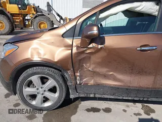 2016 Buick Encore with VIN KL4CJASB3GB588662, listed as a IAAI auction lot 41630145 with 120,332 mi miles. Bid and sale history available at carsss.com. Image 6.