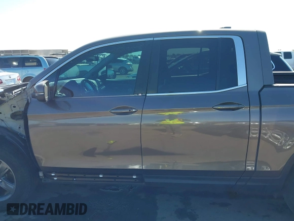 2022 Honda Ridgeline RTL with VIN 5FPYK3F58NB007618, listed as a IAAI auction lot 42258443 with 14,036 mi miles and . Bid and sale history available at DreamBid. Image 15.