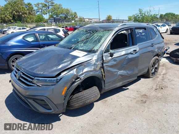 2024 Volkswagen Tiguan SE with VIN 3VVNB7AX6RM161369, listed as a IAAI auction lot 41888229 with 5,173 mi miles and . Bid and sale history available at DreamBid. Image 2.
