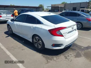 2016 Honda Civic EX-L z VIN 2HGFC1F83GH636374, wystawiony jako IAAI lot #42328432 z przebiegiem 130 738 mil mil oraz . Historia ofert i sprzedaży dostępna na DreamBid. Obrazek 3.