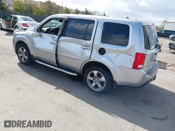 2012 Honda Pilot EX-L with VIN 5FNYF3H5XCB016571, listed as a IAAI auction lot 41905676 with 146,457 mi miles. Bid and sale history available at carsss.com. Image 3.