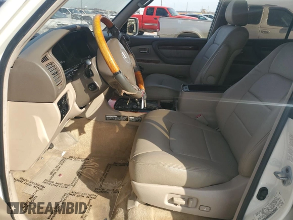 2002 Lexus LX 470 z VIN JTJHT00W623514108, wystawiony jako Copart lot #88704265 z przebiegiem Nie podano mil oraz Tytuł czysty. Historia ofert i sprzedaży dostępna na DreamBid. Obrazek 7.