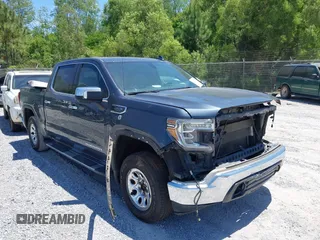 2021 GMC Sierra 1500 SLT z VIN 3GTU9DED5MG150987, wystawiony jako IAAI lot #42123282 z przebiegiem 206 620 mil mil oraz . Historia ofert i sprzedaży dostępna na DreamBid. Obrazek 1.