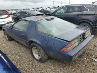 1987 Chevrolet Camaro with VIN 1G1FP21H6HN165757, listed as a Copart auction lot 49590175 with 35,793 mi miles and Clean Title. Bid and sale history available at carsss.com. Image 2.