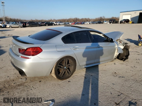 2013 BMW 6 Series 650i with VIN WBA6B2C58DD128277, listed as a Copart auction lot 87384254 with 115,965 mi miles and Salvage Title. Bid and sale history available at DreamBid. Image 3.