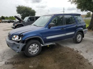 1999 Honda CR-V LX with VIN JHLRD1840XC037215, listed as a Copart auction lot 71116744 with 156,385 mi miles and Salvage Title. Bid and sale history available at carsss.com. Image 1.