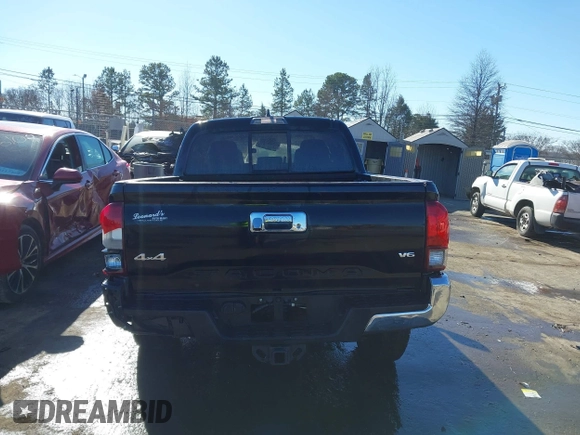2018 Toyota Tacoma SR with VIN 5TFCZ5ANXJX124991, listed as a IAAI auction lot 41136867 with 57,980 mi miles and . Bid and sale history available at carsss.com. Image 16.