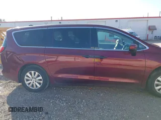 2021 Chrysler Voyager L z VIN 2C4RC1AG1MR542042, wystawiony jako IAAI lot #40626082 z przebiegiem 119 431 mil mil oraz . Historia ofert i sprzedaży dostępna na DreamBid. Obrazek 13.