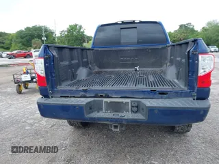2019 Nissan Titan XD SV with VIN 1N6BA1F46KN514637, listed as a IAAI auction lot 41986617 with 123,872 mi miles. Bid and sale history available at carsss.com. Image 16.