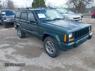 2000 Jeep Cherokee Classic with VIN 1J4FF58S3YL258755, listed as a IAAI auction lot 42020260 with 228,867 mi miles. Bid and sale history available at carsss.com. Image 1.