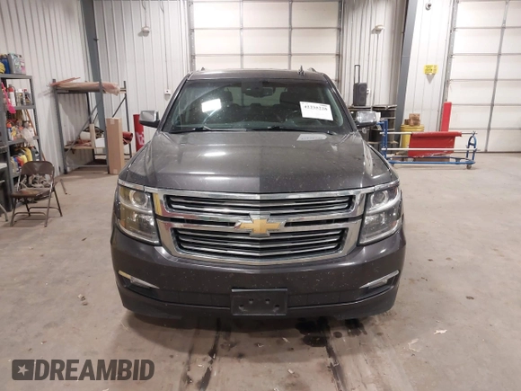 2016 Chevrolet Tahoe LTZ with VIN 1GNSKCKC1GR201155, listed as a IAAI auction lot 42235228 with 184,585 mi miles and . Bid and sale history available at DreamBid. Image 12.