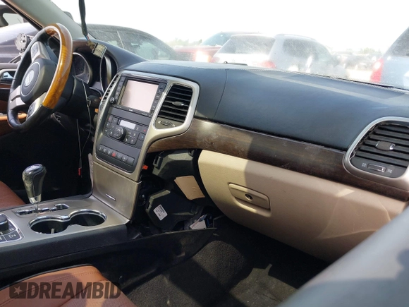 2011 Jeep Grand Cherokee Overland Summit with VIN 1J4RR6GTXBC683854, listed as a IAAI auction lot 42626452 with Not provided miles and . Bid and sale history available at DreamBid. Image 5.
