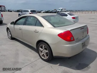 2009 Pontiac G6 w/1SA *Ltd Avail* with VIN 1G2ZG57N394223449, listed as a IAAI auction lot 42070388 with 75,089 mi miles. Bid and sale history available at carsss.com. Image 3.