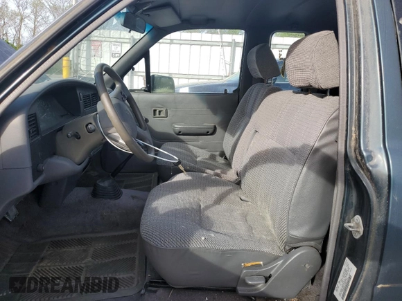 1994 Toyota Pickup z VIN 4TARN93P1RZ213243, wystawiony jako Copart lot #54068005 z przebiegiem 220 450 mil mil oraz Czysty tytuł • Clean title. Historia ofert i sprzedaży dostępna na DreamBid. Obrazek 7.