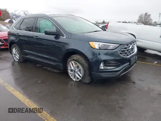 2022 Ford Edge SEL z VIN 2FMPK4J90NBA71360, wystawiony jako IAAI lot #41724316 z przebiegiem 35 309 mil mil oraz . Historia ofert i sprzedaży dostępna na DreamBid. Obrazek 1.
