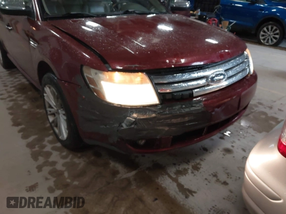 2008 Ford Taurus Limited with VIN 1FAHP28W28G153930, listed as a IAAI auction lot 42154827 with 243,386 mi miles. Bid and sale history available at carsss.com. Image 6.
