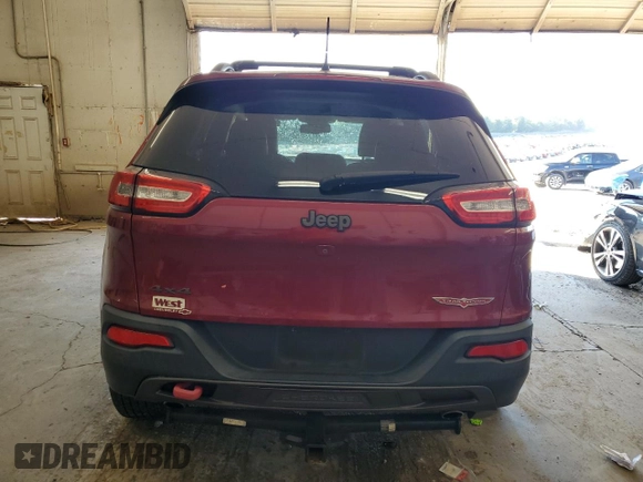 2015 Jeep Cherokee Trailhawk with VIN 1C4PJMBS1FW745928, listed as a Copart auction lot 62032585 with 132,559 mi miles and Salvage title. Bid and sale history available at DreamBid. Image 6.