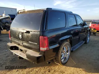 2003 Cadillac Escalade z VIN 1GYEC63TX3R135227, wystawiony jako Copart lot #88373245 z przebiegiem 258 595 mil mil oraz Czysty tytuł • Clean title. Historia ofert i sprzedaży dostępna na DreamBid. Obrazek 3.