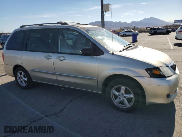 2002 Mazda MPV LX with VIN JM3LW28J020309014, listed as a Copart auction lot 81004584 with 249,161 mi miles and Salvage title. Bid and sale history available at DreamBid. Image 4.