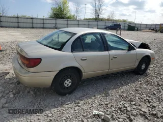 2001 Saturn SL z VIN 1G8ZK52741Z200069, wystawiony jako Copart lot #56360685 z przebiegiem 115 673 mil mil oraz Nie do naprawy. Historia ofert i sprzedaży dostępna na DreamBid. Obrazek 3.