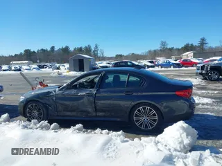 2019 BMW 5 Series 530i xDrive with VIN WBAJA7C50KWW05263, listed as a IAAI auction lot 41571583 with 71,185 mi miles and . Bid and sale history available at DreamBid. Image 14.