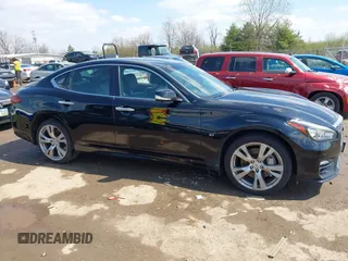 2015 Infiniti Q70 with VIN JN1BY1ARXFM562402, listed as a IAAI auction lot 41910400 with 131,469 mi miles and . Bid and sale history available at DreamBid. Image 14.
