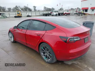 2021 Tesla Model 3 Long Range with VIN 5YJ3E1EB2MF079595, listed as a IAAI auction lot 41621546 with 45,616 mi miles. Bid and sale history available at carsss.com. Image 3.