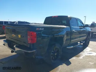 2015 Chevrolet Silverado 1500 LTZ with VIN 3GCUKSEC0FG482502, listed as a IAAI auction lot 41292001 with 129,622 mi miles. Bid and sale history available at carsss.com. Image 4.