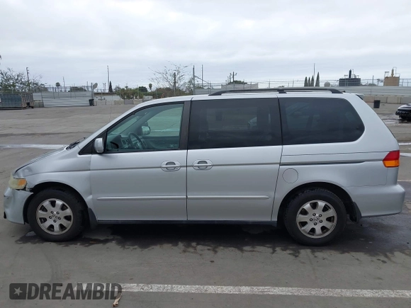 2003 Honda Odyssey EX-L with VIN 5FNRL18943B030373, listed as a IAAI auction lot 41867289 with 179,718 mi miles and . Bid and sale history available at DreamBid. Image 14.