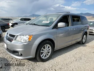 2018 Dodge Grand Caravan SXT z VIN 2C4RDGCG9JR328568, wystawiony jako Copart lot #66045695 z przebiegiem 125 425 mil mil oraz Czysty tytuł • Clean title. Historia ofert i sprzedaży dostępna na DreamBid. Obrazek 1.