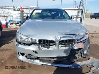 2014 BMW 3 Series 320i with VIN WBA3B1G58ENS81101, listed as a IAAI auction lot 38950717 with 1 mi miles. Bid and sale history available at carsss.com. Image 11.