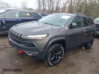 2018 Jeep Cherokee Trailhawk with VIN 1C4PJMBB3JD516090, listed as a IAAI auction lot 41460960 with 97,639 mi miles. Bid and sale history available at carsss.com. Image 17.