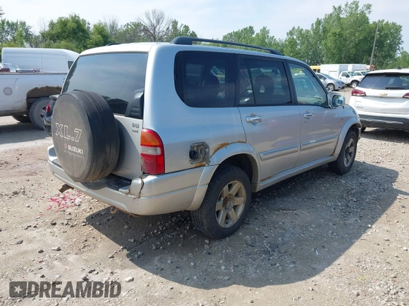 2003 Suzuki XL7 Touring with VIN JS3TX92V534103256, listed as a IAAI auction lot 42649985 with 133,195 mi miles and . Bid and sale history available at DreamBid. Image 4.