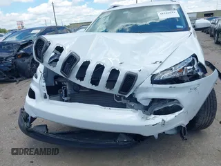 2018 Jeep Cherokee Latitude with VIN 1C4PJLCX3JD551801, listed as a IAAI auction lot 42226643 with 89,246 mi miles and . Bid and sale history available at DreamBid. Image 6.