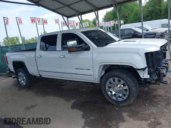 2016 GMC Sierra 2500HD Denali with VIN 1GT12UE86GF267431, listed as a IAAI auction lot 42091770 with 128,525 mi miles and . Bid and sale history available at DreamBid. Image 14.