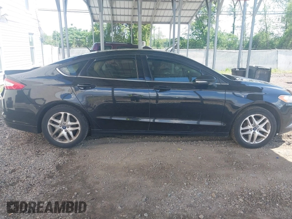 2013 Ford Fusion SE z VIN 3FA6P0H74DR121844, wystawiony jako IAAI lot #42192590 z przebiegiem 243 433 mil mil oraz . Historia ofert i sprzedaży dostępna na DreamBid. Obrazek 13.