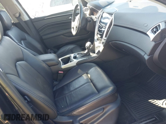 2015 Cadillac SRX with VIN 3GYFNAE35FS608595, listed as a IAAI auction lot 41282751 with 127,055 mi miles and . Bid and sale history available at DreamBid. Image 5.