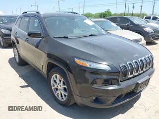 2016 Jeep Cherokee Latitude z VIN 1C4PJLCB6GW257942, wystawiony jako IAAI lot #42020649 z przebiegiem 135 808 mil mil oraz . Historia ofert i sprzedaży dostępna na DreamBid. Obrazek 1.