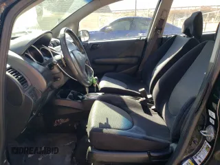 2007 Honda Fit Sport with VIN JHMGD38607S050486, listed as a Copart auction lot 49083375 with 198,601 mi miles and Salvage Title. Bid and sale history available at carsss.com. Image 7.
